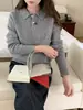 Nueva colección de otoño e invierno: Suéter 100% lana con patrón de trenzas, cuello redondo, cuello polo, mangas largas y un diseño de punto holgado, casual y versátil