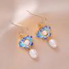 Aretes de perlas francesas transfronterizos para mujer, aretes de lujo de nicho de color mixto, fabricantes de aretes europeos y americanos al por mayor