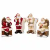 Decoraciones navideñas: Adorno de resina de Papá Noel rojo y dorado en chimenea para regalar, diseño exquisito para árbol de Navidad y exhibición de mesa