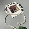 Cadena de cintura de borla tejida hecha a mano 2023 nuevo estilo retro temperamento cinturón de borla tejida para mujer
