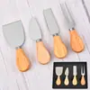 Acero inoxidable cuchillo para queso juego de cuatro piezas con mango de roble cuchillo para queso de pizza juego de regalo herramientas de repostería venta al por mayor de fábrica