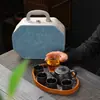 Juego de té de viaje de arcilla púrpura, que incluye una tetera y cuatro tazas, juego de té kung fu portátil para exteriores, tetera y tazas Fengming, juego de regalo de alta gama
