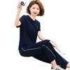 Traje deportivo de moda de verano para madres de mediana edad 2025, nuevo estilo extranjero, chaqueta para mujeres de mediana edad y mayores, conjunto de dos piezas que reduce la edad