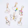 Colgante de esmalte de dibujos animados blanco, colgante de aleación en tono blanco, accesorios para manualidades, adorno colgante decorativo, accesorio para llavero, venta al por mayor