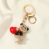 Llavero de oso con forma de corazón de dibujos animados, estilo europeo y americano, estilo a juego para parejas, colgante para mochila, colgante para coche, pequeño regalo exquisito