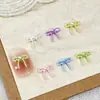 Set mixto de 50 piezas de accesorios para decoración de uñas de lazo, nuevas flores y estrellas tridimensionales de color macarrón, accesorios de resina para uñas postizas