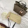 Moda japonesa y coreana retro simple estampado de leopardo bolsa de lona para el día a día 2026 nuevo para mujer otoño bolso de mano de un solo hombro bolsa de axila
