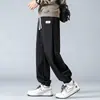Calça jogger casual masculina, nova calça esportiva de corte solto para primavera e outono para homens e adolescentes, calça de moletom versátil de perna reta na moda para homens