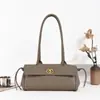 Bolso de axila de moda transfronterizo de lujo ligero para mujer, nuevo bolso baguette de nicho estilo francés con un toque vintage de alta gama, bolso de mano de un solo hombro