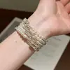 Pulseira Coreana de Pérolas e Diamantes em Camadas com Design de Alto Padrão, Elegante e Versátil, Pulseira de Pérolas e Diamantes de Nicho