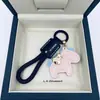 Fique Rico Imediatamente Pingente de Chaveiro de Couro de Vaca Feito à Mão para Carro Lanyard Elegante Simples Exquisito para Casais Masculinos e Femininos