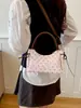 Outono 2026 Nova Bolsa de Dumpling Portátil Feminina Moda Tendência Bolsa de Mão para o Trabalho Versátil Bolsa Transversal Bolsa Feminina Atacado