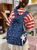 Mochila transfronteriza 2026 nueva con estampado de estrellas para niñas de secundaria y preparatoria, elegante y versátil, bolsa de doble hombro de gran capacidad