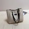 Bolsa de mano de gran capacidad bolsa de paja para vacaciones estilo nuevo nicho bolsa de hombro para el trabajo de moda verano playa costa mujeres