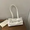 Fivela de Cinto Cor Sólida Estilo Novo Verão 2026 Bolsa Simples e Fashion Baguette Casual Grande Capacidade Bolsa de Ombro para Motociclista