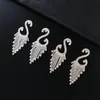 Pendientes de cadena de garra transfronterizos europeos y americanos borla de pedrería geométricos de cisne pendientes de personalidad femenina fábrica directa E747