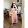 Falda Larga de Encaje con Cordones y Cuello en V Estilo Francés para Mujer Otoño 2025 Nuevo Estilo Literario Estilo Perezoso Suelta Dobladillo Amplio Vestido Largo