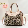 Bolso de Mano de Comercio Exterior Simple de Gran Capacidad con Empalme de Color Contrastante Estampado de Leopardo Textura de Lujo Ligero de Gama Alta Bolso de Mamá de Moda para Viajes