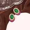 Pendientes de botón para oreja aretes aretes diseño geométrico verde europeo y americano retro avanzado exquisito lujo ligero temperamento nicho moda
