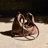 Bolsas Bolsas para Mujer 2025 Primavera/Verano Nuevo Bolso Tote de Cuero Curtido Vegetal Vintage Moderno Versátil Bolso de Hombro para Viajar