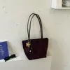 Bolso casual de ante para debajo del brazo para mujer, nuevo modelo 2026, bolso tipo cubo versátil y ligero, bolso de mano para ir al trabajo, bolso de hombro, transfronterizo