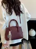 Bolsa retrô estilo coreano com formato de concha para mulheres, nova coleção 2026, bolsa tote casual com tema de boliche, bolsa de ombro e bolsa transversal versátil