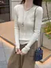 Suéter de punto con cuello en V para mujer, corte ajustado, muestra la figura, manga larga, color liso, suéter básico 2026, nuevo top versátil