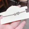 Pulsera de Estilo Lujo Ligero con Corazón de Circonita y Estrella Calada Deslizante Joyería de Mano Exquisita Simple de Nicho Elegante de Alta Gama para Mujer
