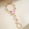 Collar multicapa de flor de resina estilo europeo y americano con gotas de aceite y diamantes, cadena de clavícula de dopamina personalizada, pulsera y collar de alta gama