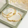 Wanxing Europeo y Americano Acero Inoxidable 18K Línea Asimétrica Abierto Pulsera Única Elegante Transfronterizo Más Vendido Pulsera Que No Se Desvanece