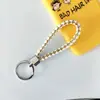 Llavero creativo llavero de cuerda de cuero cordón para llaves colgante de joyería cordón tejido fábrica de cuerda de cuero venta al por mayor