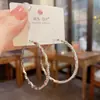 Brincos de Argola Grande Ondulados com Strass Simples da Moda Dongdaemun Coreana para Mulheres, Brincos Tendência Exagerados Estilo Minimalista Atacado