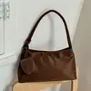 Bolso de axila de nicho transfronterizo para mujer, nueva moda otoño 2026, moderno, lujo ligero, alta gama, elegante bolso de mano y bolso de hombro
