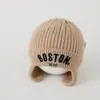 Gorro tejido cálido para bebé con protección para las orejas para otoño e invierno, gorro de invierno engrosado estilo coreano para niños, sombrero de invierno nuevo y elegante para niños y niñas