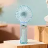 2026 Ventilador de Mão Transparente Simples Criativo Ventilador Pequeno Portátil de Verão para Exterior com Clipe Recarregável via USB