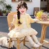 Conjunto de duas peças de outono para meninas: cardigã floral e saia de tule, novo modelo 2026, roupa tipo saia bolo, vestuário infantil, dropshipping