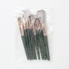 Directo de fábrica 14 pinceles de maquillaje nube verde juego completo de pincel para polvos de pelo suave de Cangzhou pincel para sombras de ojos conveniente con almacenamiento de PU