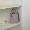 Popular bolso bandolera de un solo hombro para teléfono de verano, nuevo modelo 2026, bolso pequeño cuadrado tridimensional de mano, minibolso de nicho para mujer