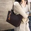 Bolso Tote simple estilo nuevo versátil otoño bolsa de gran capacidad para mujeres 2026 bolso de hombro para ir al trabajo moderno casual