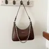 Bolsa de ombro e transversal transfronteiriça 2026, modelo novo, design de nicho único, moderna e estilosa, bolsa de ombro e transversal da moda para o dia a dia.
