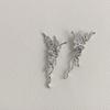 ¡Diablo! Aretes de flores de metal líquido de moda nicho viento frío aretes moda temperamento aretes ins