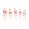 Uñas postizas ponibles con un toque de alta gama, populares en línea, manicura de lazo, lindo diseño de corazón girly, uñas estilo dulce y puro deseo