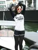 2026 Modelo Nuevo Estilo Japonés y Coreano Conjunto de Dos Piezas para Mujer Traje de Baño de Manga Larga Protector Solar para Playa Venta al por Mayor en Stock para Comercio Transfronterizo