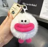 Lindo Colgante para Llaves de Coche Colgante de Bola de Carbón Pequeña con Boca Grande Colgante para Bolso Muñeca de Bola de Felpa Juguete