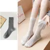 Calcetines de algodón peinado para mujer de primavera y otoño hasta la pantorrilla, calcetines básicos lisos de moda para mujer, calcetines blancos apilables