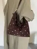 Bolso cubo de ante de gran capacidad transfronterizo para mujer, nuevo bolso de hombro retro mate 2026, bolso cruzado de nicho para el día a día