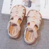 Sandalias Romanas Mágicas Huecas para Niños 2026 Verano Nuevas Estilo Coreano para Niñas con Moño Punta Abierta Zapatos de Princesa