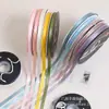 Lazo de regalo de color sólido de 1 cm flor decorativa para envolver material para ramos de cinta de satén venta al por mayor