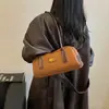 Bolsa de textura luxo leve feminina 2026 verão nova tendência bolsa de ombro único transversal bolsa de mão retro Boston bolsa feminina fashion