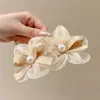 Accesorio de pinza para el pelo floral de Zhao Lusi para mujer, perfecto para vacaciones en la playa y sesiones de fotos, creando un look atmosférico